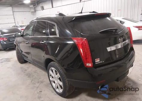 2013 Cadillac Srx Premium Collection z USA, uszkodzony, nr VIN 3GYFNJE31DS609871